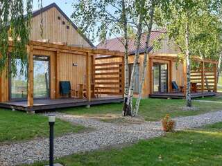 Виллы Kamienny Ogród Holiday Park Миколайки Вилла с видом на сад-28